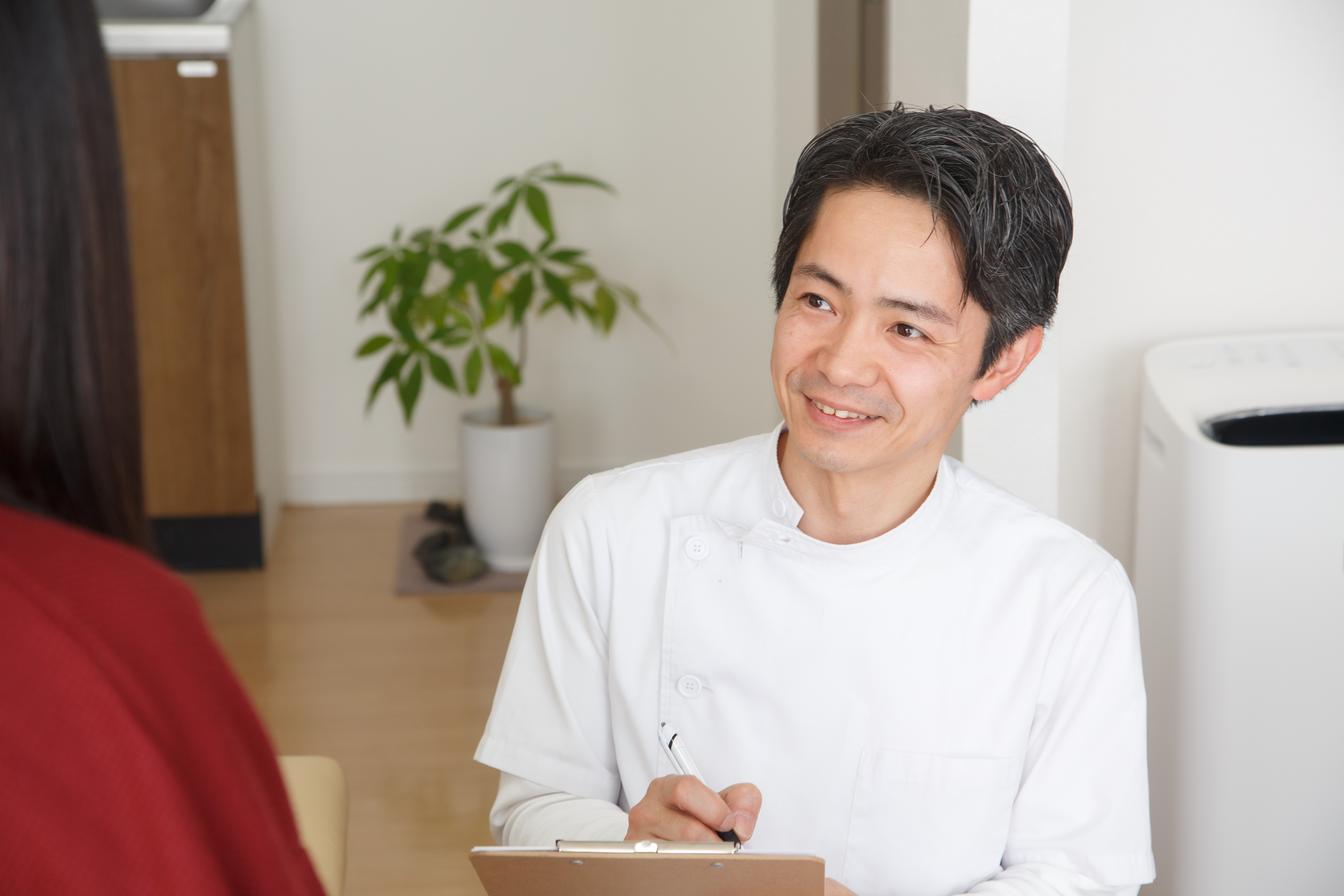 米子市こだま整体の問診風景